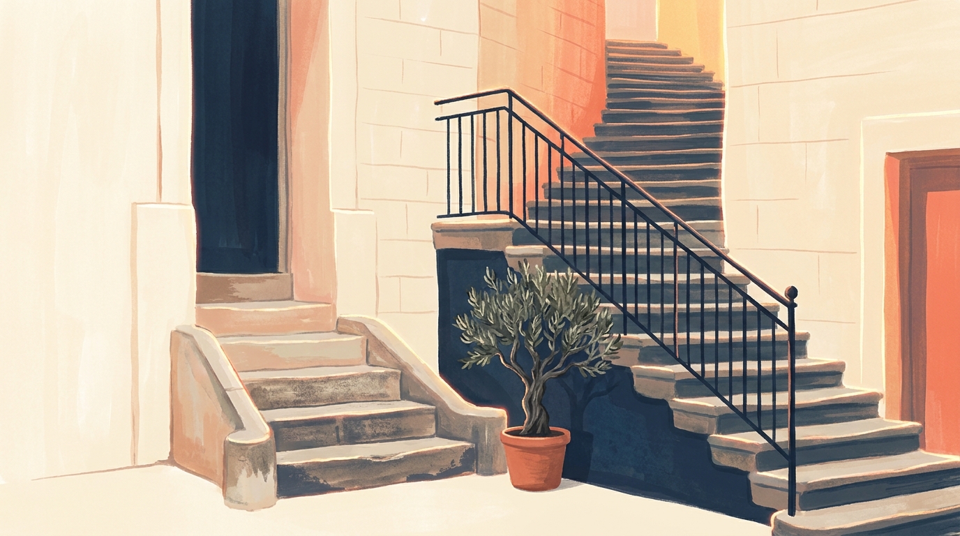 Two stone staircases side by side against a pale building facade, one short and one much longer, with warm evening light falling between them.